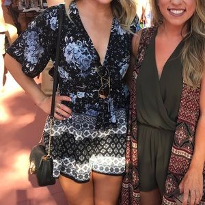 Blue and black romper worn once size small